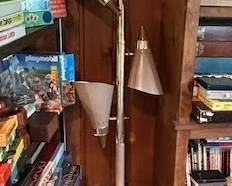Mid-Century Modern tension pole lamp featuring 3 adjustable shades and built in table tray.