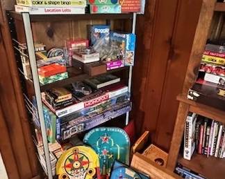 Large collection of vintage board games and tin games.