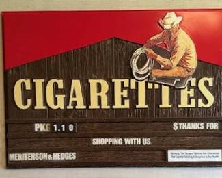 Vintage 1970s "Marlboro Man" cigarette advertising sign.