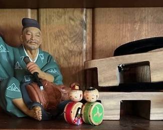 Japanese Clay figure, nesting dolls and Geta Shoes.