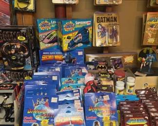 Various vintage Kenner Super Powers action figures and vehicles.