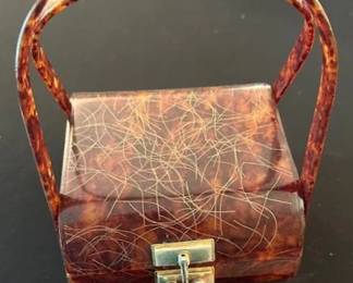 Vintage 1950's marbled Lucite amber rootbeer handbag.