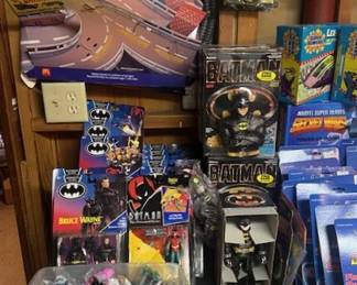 Large collection of Batman collectables and figures.