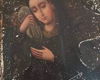 "Our Lady of Sorrows" on tin.