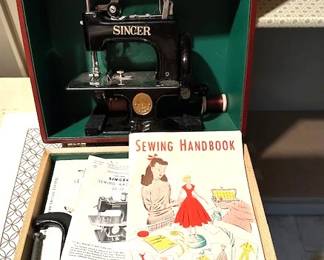 Vintage Singer Model 20 "Sewhandy" child's sewing machine with original case, instruction manual.