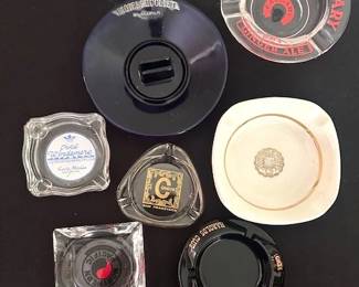 Vintage variety of ashtrays of popular destinations.