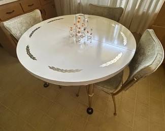 Mid-Century Modern kitchen table (3 chairs-so far) and still looking for the leaf.