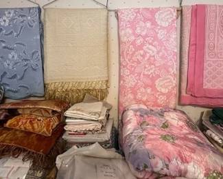Vintage linens, including woolen blankets, tablecloths, bath towels, sheets, etc.