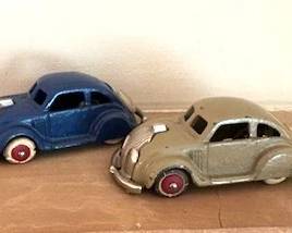 Vintage Hubley cast iron Chrysler Airflow toy cars.