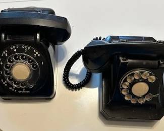 Vintage Bell System Western Electric Handset Black Telephone and vintage black bakelite rotary dial telephone, 1940s.