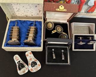 Vintage Japanese Sterling pagoda salt & pepper, sterling pagoda earrings, Gianni Versace gold-tone Medusa cufflinks, and chopstick rest.