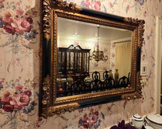 Black and gold statement mirror