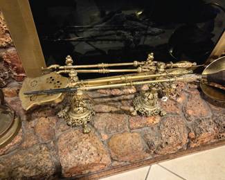 Laying brass fireplace set
