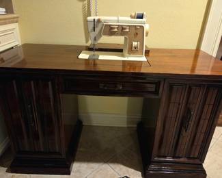 Sewing machine and cabinet