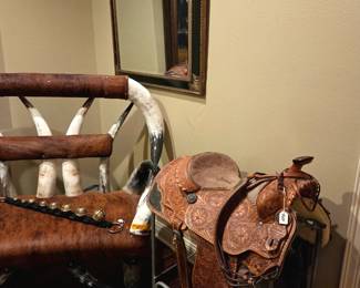 Saddle amd cow horn and hide chairs and sofas