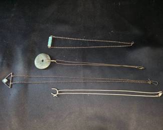 Four Necklaces with Various Stone Pendants