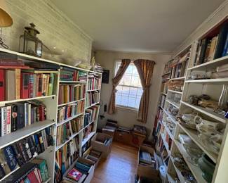 So many good books, vintage RECORDS and china in this room!