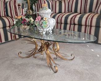 1980 glass coffee table with metal legs