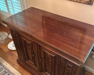 Flip Top buffet server , has wheels . Located dining room 