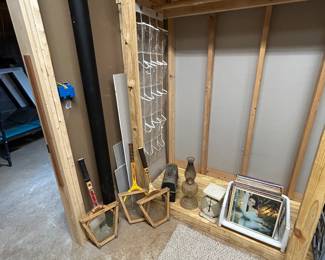 Vintage tennis rackets and vinyl records. Location basement