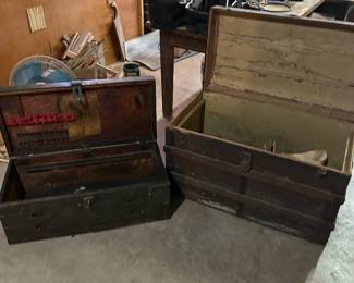 Vintage trunks located in basement wood shop