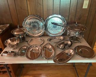 Sliver plated serving items , located in living room