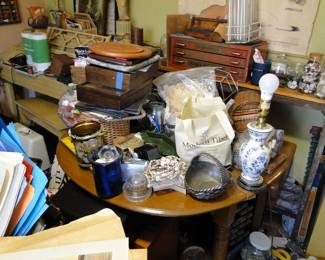 Red tool box filled with tools, miscellany