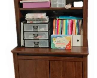 Crafting Hutch With Variety Of Art Supplies