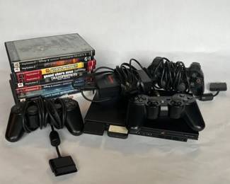 PlayStation 2 with Controllers and Games