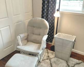 Glider Rocking Chair, Rug, Hamper And Light In Neutral Colors