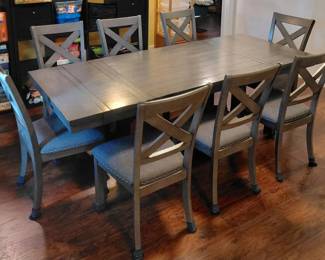 Graphite Gray Dining Table With 8 Riveted Chairs