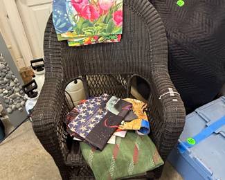 Wicker Rocking Chair with Decorative Garden Flags