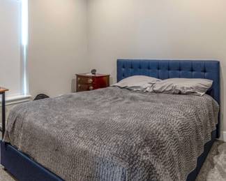 Queen blue button fabric headboard, footboard and side rails.