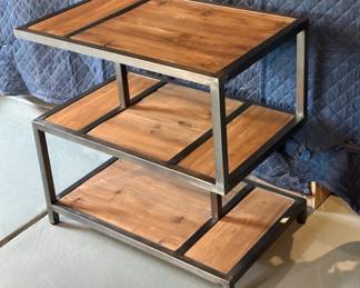 Up Close Image of metal and wood industrial design table.