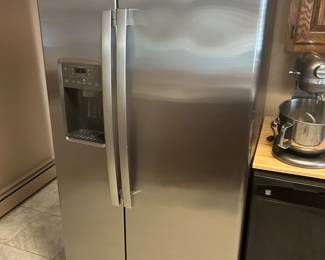GE stainless steel side-by-side refrigerator freezer
