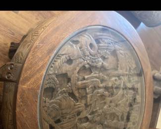 Asian coffee/tea round table with 4 round stools.  Carved scene, "Men in Village"  $850