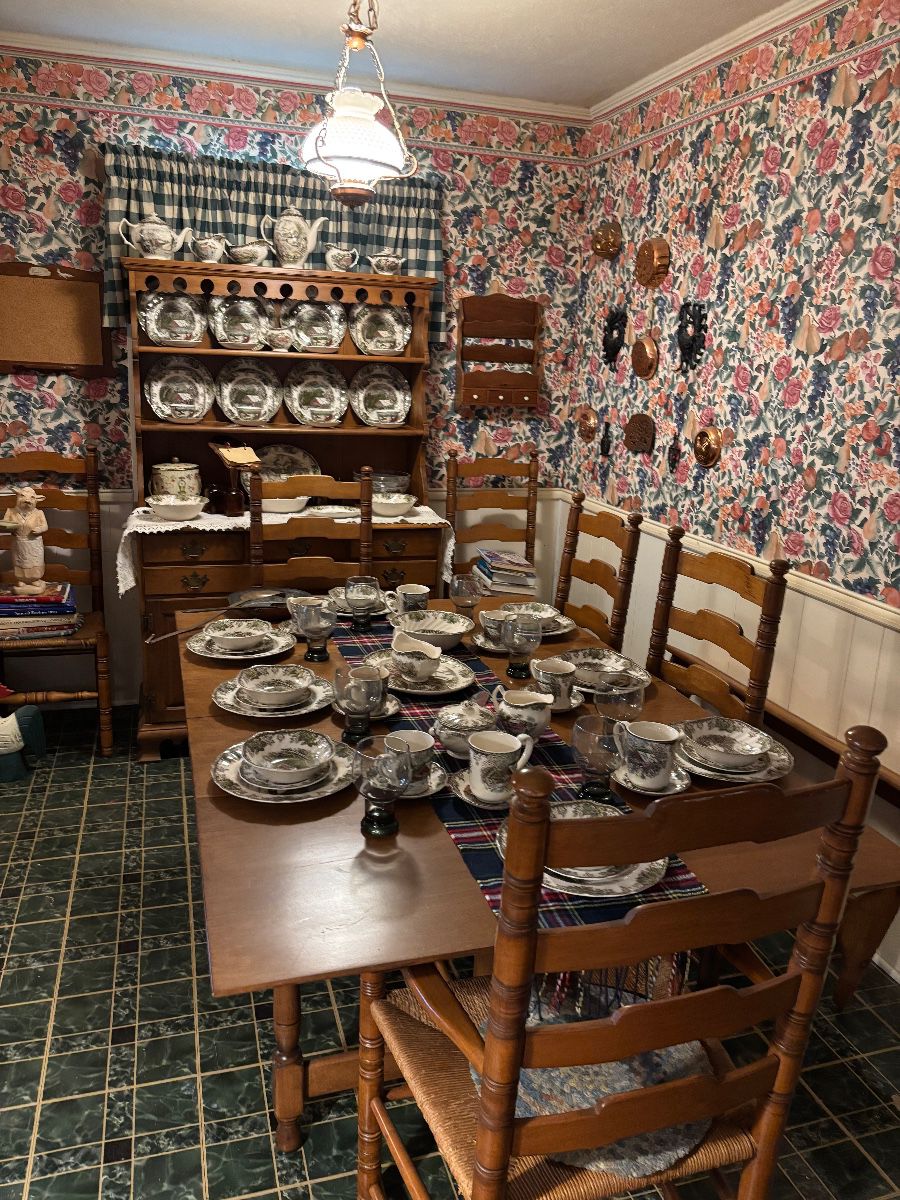 Large set of “Friendly Village” china