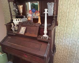 Interesting old pump organ. This would make a great bar!