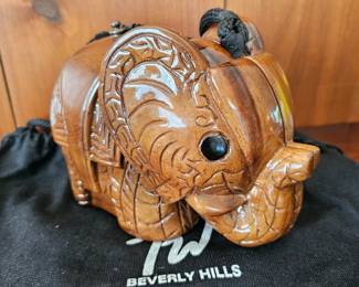 Timmy Woods Beverly Hills elephant-shaped hand-carved wooden handbag.
