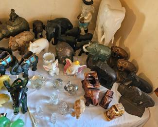Massive elephant figurine collection. Figurines made of wood, stone, metal, brass, ceramic, porcelain, bone & MORE !