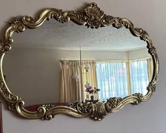 Ornate Giltwood Mirror with Floral and Scrollwork Motifs