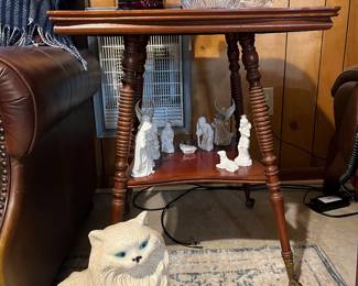 Ball and Claw Antique Table - Walnut?, Ceramic Cat, Anchor Hocking Royal Ruby Red Vase, Red Avon Candleholders, Clear Glassware. Ceramic Nativity Set