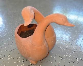 terracotta swan or duck themed planter