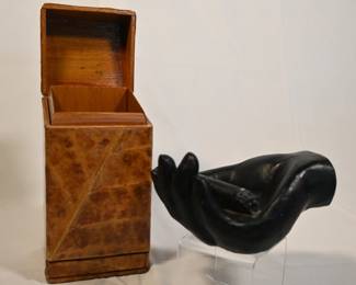 Vintage hinged tobacco box and hand-shaped cigar ashtray