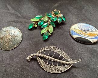BROOCHES