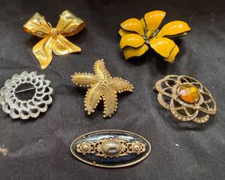 BROOCHES