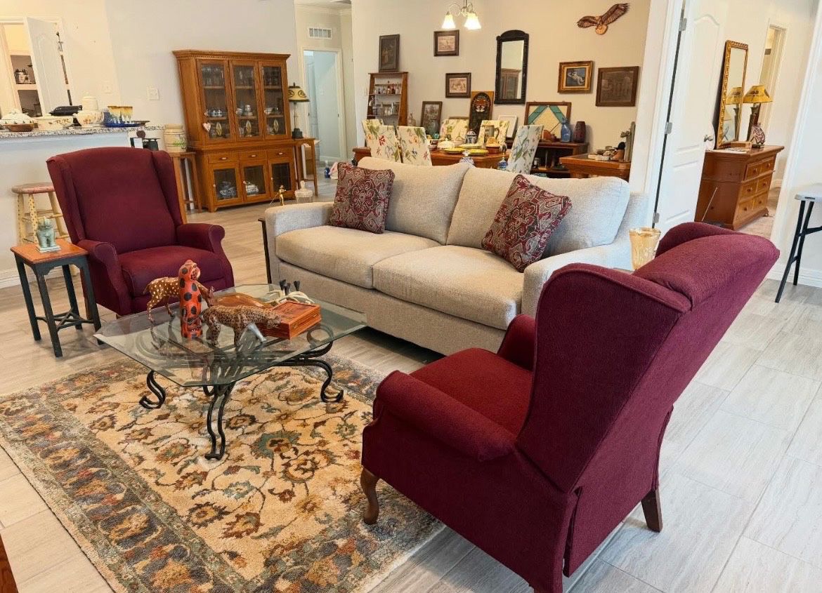 Lazy Boy sofa, glass and iron coffee table, two high back reclining chairs