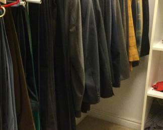 Closet filled with Men's Suits, Pants, Jackets