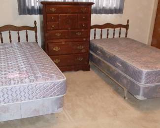 twin beds and dresser