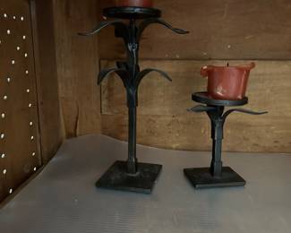 CAST IRON CANDLE STANDS.
